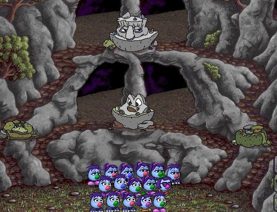 The zoombinis stand at the foot of four staircases guarded by four stone golems