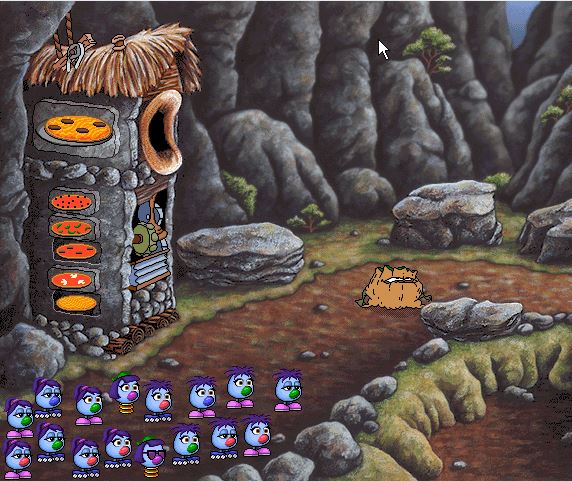 The zoombinis are blocked by a displeased looking cartoon anthropomorphic tree-stump. On the left is a machine for making pizzas.
